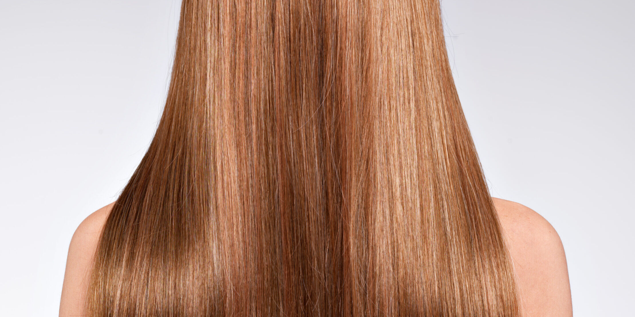 Rear view  of the woman with long  hair